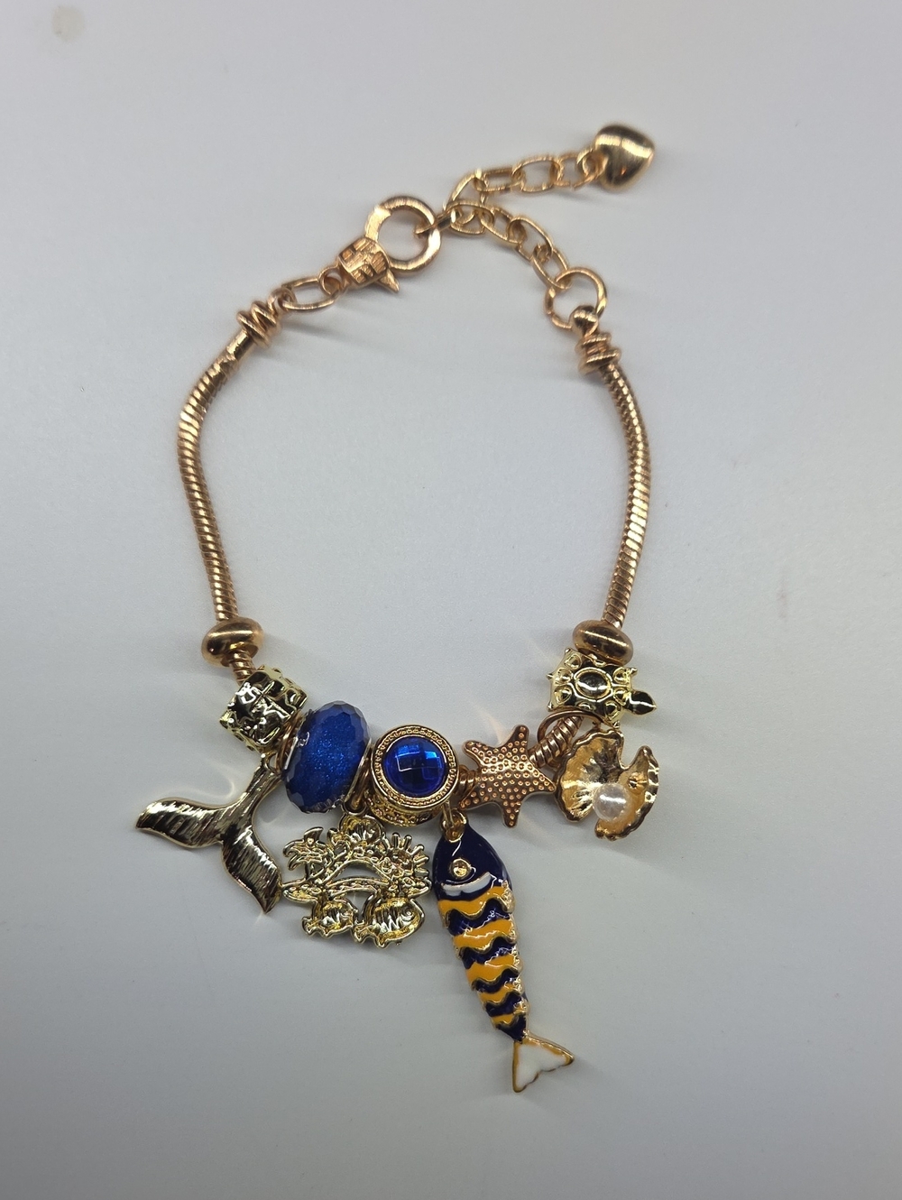 Gold-Tone Nautical Charm Bracelet with Blue Accents. W/extender Chain